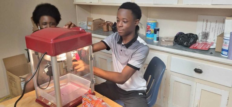 Our Interns Making Popcorn for Movie Day