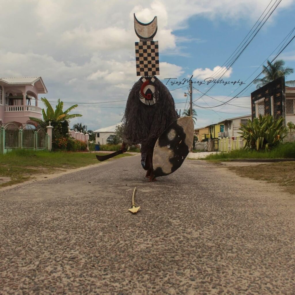 “In color, “urbanscape,” 2020. Masquerade Mask by: Gerry Gittens. Source: ACDA Guyana